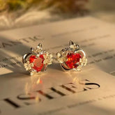 Aretes de perno de joyería Love And Deepspace Xia Yizhou con rubíes y zirconia en forma de begonia, estilo dulce y elegante.