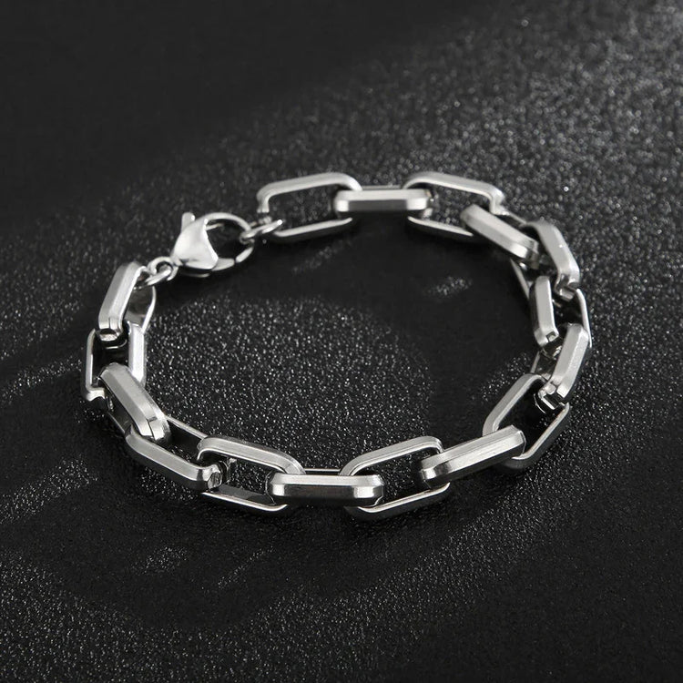 Pulsera de acero titanio para hombres con diseño geométrico y estilo hip-hop, de la marca JewerlyDreams.