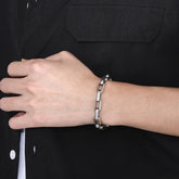 Pulsera de acero titanio para hombres con diseño geométrico y estilo hip-hop, de la marca JewerlyDreams
